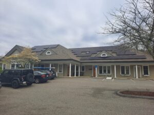 Commercial solar panel installation on the roof of Kirk Dental in Sudbury, MA, completed by Brightstar Solar, a Top Solar Contractor serving Middlesex County.