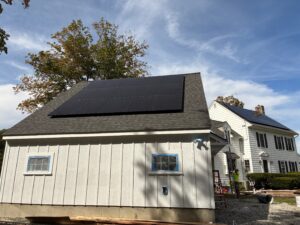 All-black aesthetic solar panel installation on a local Westborough building by Brightstar Solar.