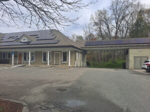 Commercial solar panel installation on a dental office in Sudbury, MA by Brightstar Solar.