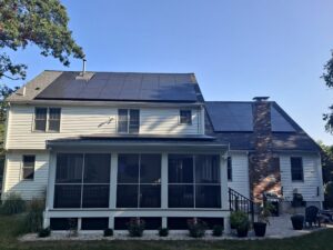 Rear-roof solar installation on a Holliston, MA home in Middlesex County, optimized for high production and low street-side visibility.